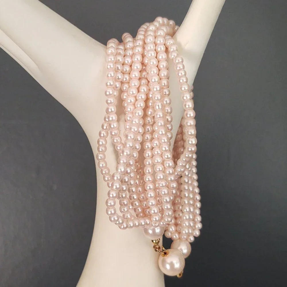 Vintage multi strand pink beaded necklace and bracelet set